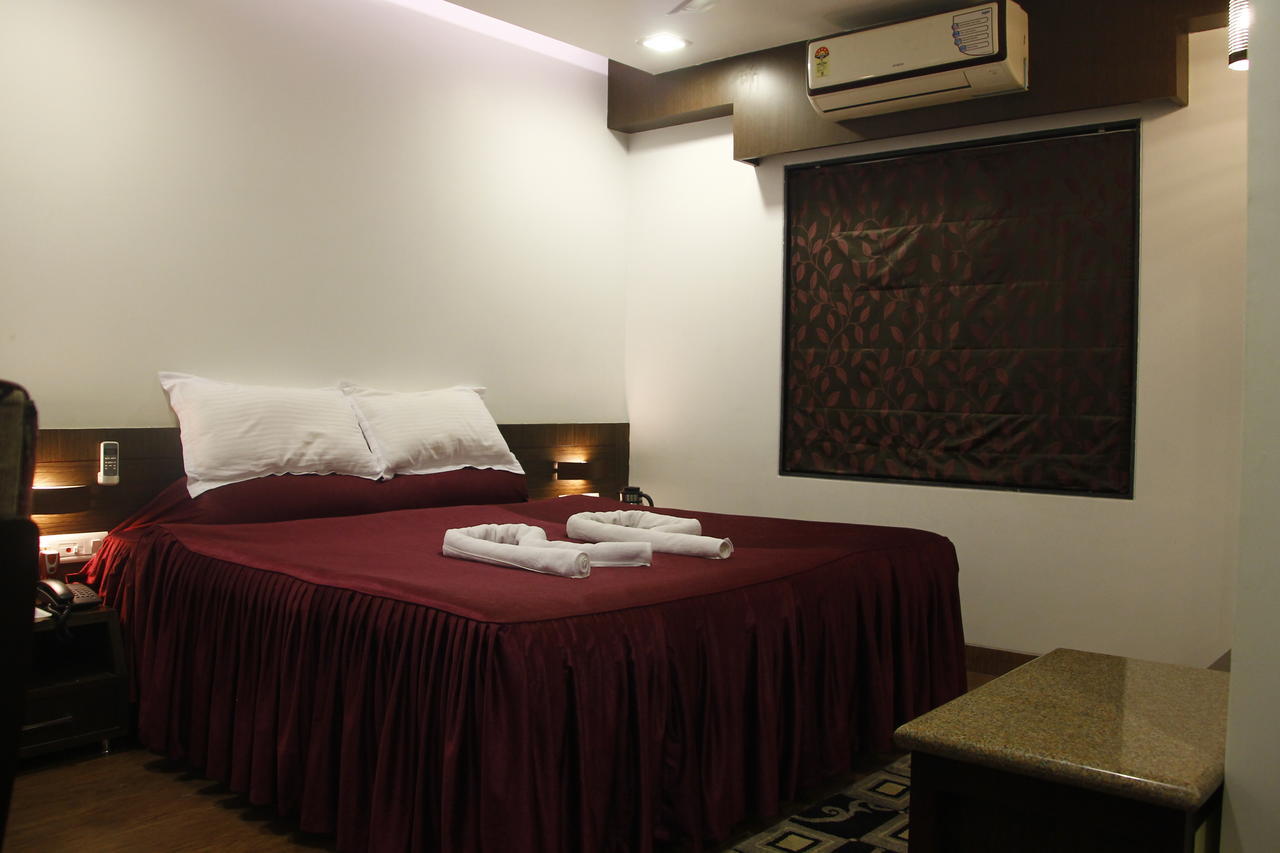 Hotel Rajashree Palace Сіліґурі Номер фото