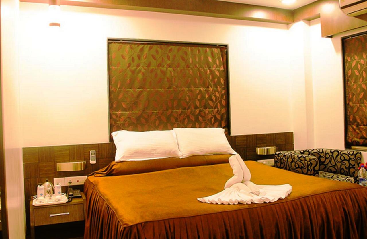 Hotel Rajashree Palace Сіліґурі Номер фото